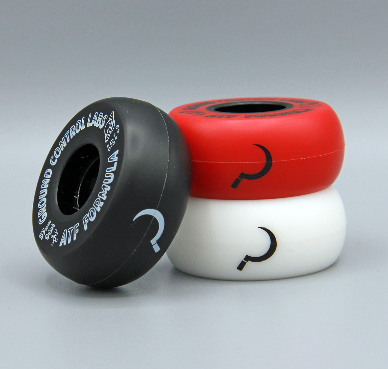 Black, Red, and White GC 57mm ATF Inline Skate Wheels at Intuition Skate Shop